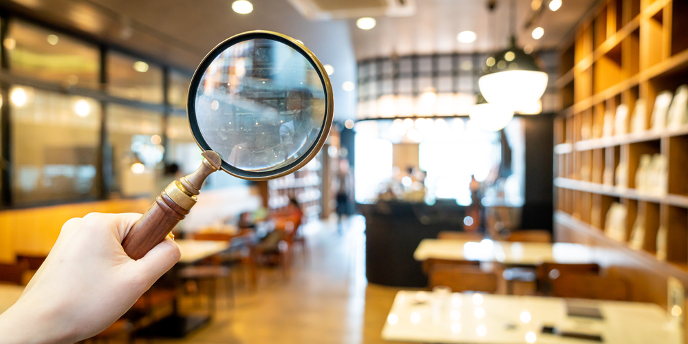 magnifying glass symbolizing use of restaurant data analytics