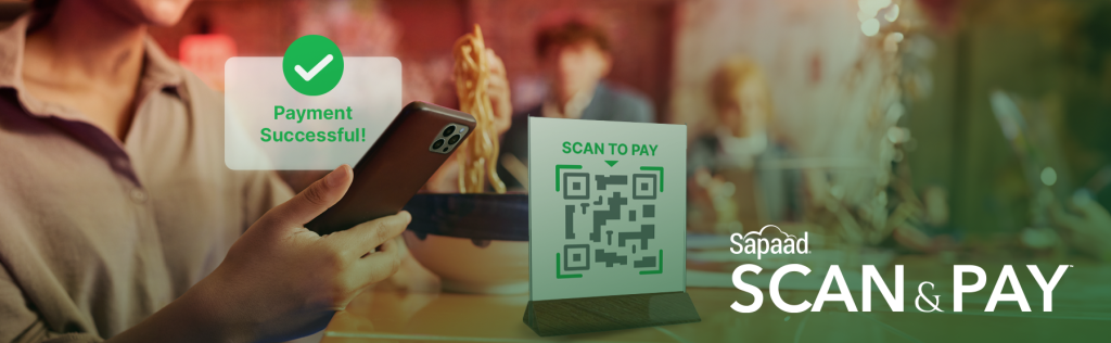 customer in restaurant scanning table QR with smartphone